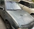 Сірий Деу Нексія, об'ємом двигуна 1.5 л та пробігом 250 тис. км за 623 $, фото 1 на Automoto.ua