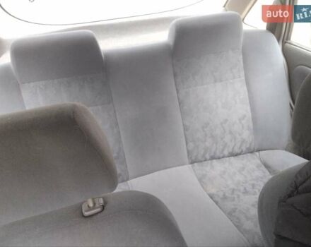 Сірий Деу Нексія, об'ємом двигуна 1.5 л та пробігом 233 тис. км за 1600 $, фото 9 на Automoto.ua