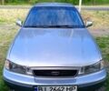 Сірий Деу Нексія, об'ємом двигуна 1.5 л та пробігом 210 тис. км за 1560 $, фото 1 на Automoto.ua