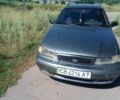 Сірий Деу Нексія, об'ємом двигуна 1.5 л та пробігом 243 тис. км за 876 $, фото 1 на Automoto.ua