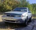 Сірий Деу Нексія, об'ємом двигуна 1.5 л та пробігом 400 тис. км за 1699 $, фото 1 на Automoto.ua