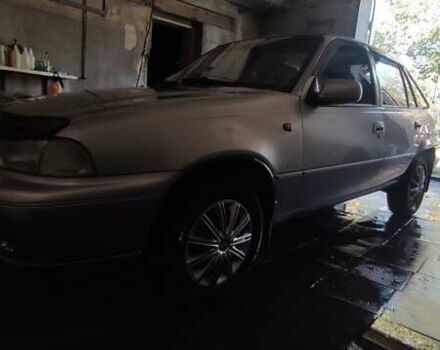 Сірий Деу Нексія, об'ємом двигуна 1.5 л та пробігом 400 тис. км за 1699 $, фото 15 на Automoto.ua