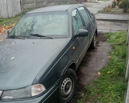 Серый Дэу Нексия, объемом двигателя 0 л и пробегом 235 тыс. км за 715 $, фото 2 на Automoto.ua