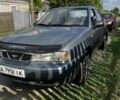 Серый Дэу Нексия, объемом двигателя 1.5 л и пробегом 180 тыс. км за 1200 $, фото 1 на Automoto.ua