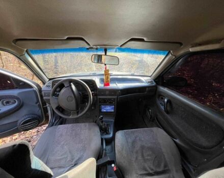 Серый Дэу Нексия, объемом двигателя 10 л и пробегом 200 тыс. км за 1199 $, фото 4 на Automoto.ua