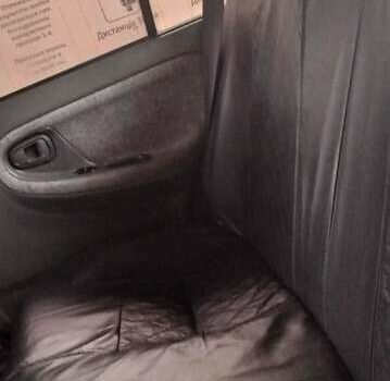 Сірий Деу Нексія, об'ємом двигуна 1.5 л та пробігом 95 тис. км за 1650 $, фото 20 на Automoto.ua