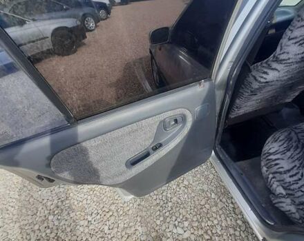 Сірий Деу Нексія, об'ємом двигуна 1.5 л та пробігом 250 тис. км за 1190 $, фото 6 на Automoto.ua