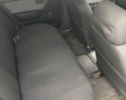 Сірий Деу Нексія, об'ємом двигуна 1.5 л та пробігом 30 тис. км за 1400 $, фото 4 на Automoto.ua