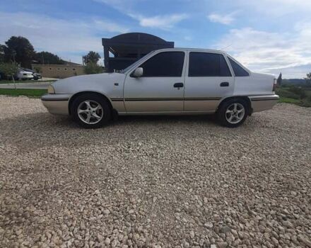 Сірий Деу Нексія, об'ємом двигуна 1.5 л та пробігом 250 тис. км за 1190 $, фото 1 на Automoto.ua