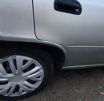 Сірий Деу Нексія, об'ємом двигуна 1.5 л та пробігом 150 тис. км за 1550 $, фото 2 на Automoto.ua