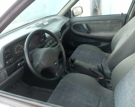 Сірий Деу Нексія, об'ємом двигуна 1.5 л та пробігом 3 тис. км за 1413 $, фото 3 на Automoto.ua