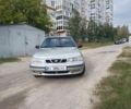 Сірий Деу Нексія, об'ємом двигуна 1.5 л та пробігом 139 тис. км за 2000 $, фото 1 на Automoto.ua