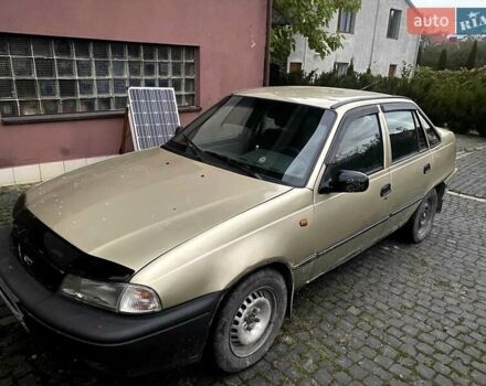 Серый Дэу Нексия, объемом двигателя 1.6 л и пробегом 208 тыс. км за 1200 $, фото 2 на Automoto.ua