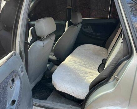 Серый Дэу Нексия, объемом двигателя 10 л и пробегом 200 тыс. км за 1199 $, фото 3 на Automoto.ua