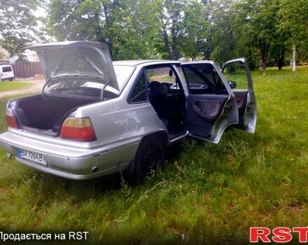 Сірий Деу Нексія, об'ємом двигуна 1.5 л та пробігом 231 тис. км за 1500 $, фото 12 на Automoto.ua