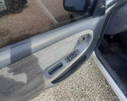 Сірий Деу Нексія, об'ємом двигуна 1.5 л та пробігом 250 тис. км за 1190 $, фото 9 на Automoto.ua