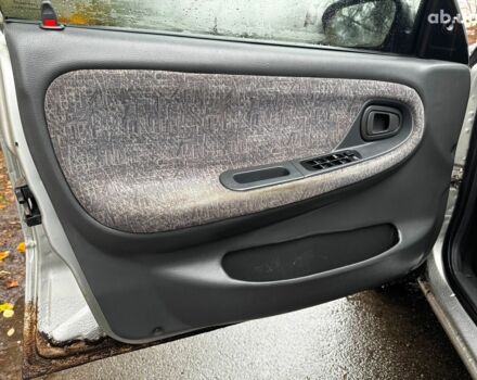 Сірий Деу Нексія, об'ємом двигуна 1.5 л та пробігом 159 тис. км за 2190 $, фото 9 на Automoto.ua