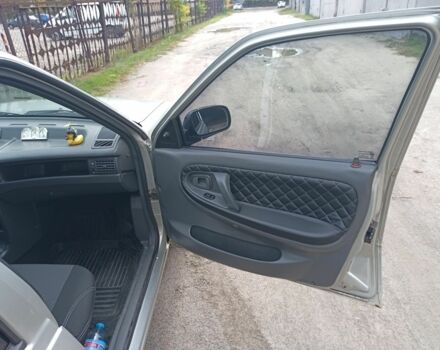 Сірий Деу Нексія, об'ємом двигуна 1.5 л та пробігом 137 тис. км за 2250 $, фото 18 на Automoto.ua