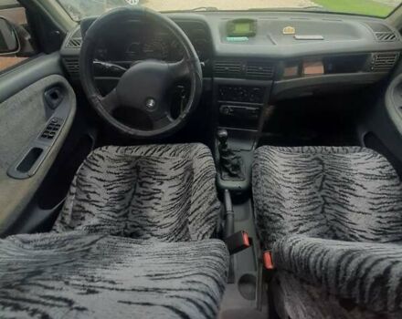 Сірий Деу Нексія, об'ємом двигуна 1.5 л та пробігом 250 тис. км за 1190 $, фото 10 на Automoto.ua