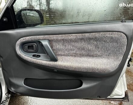 Сірий Деу Нексія, об'ємом двигуна 1.5 л та пробігом 159 тис. км за 2190 $, фото 23 на Automoto.ua