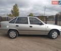 Сірий Деу Нексія, об'ємом двигуна 1.5 л та пробігом 139 тис. км за 1950 $, фото 1 на Automoto.ua