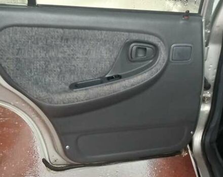 Сірий Деу Нексія, об'ємом двигуна 1.5 л та пробігом 95 тис. км за 1650 $, фото 22 на Automoto.ua