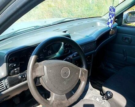 Сірий Деу Нексія, об'ємом двигуна 1.5 л та пробігом 157 тис. км за 2000 $, фото 4 на Automoto.ua
