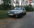 Сірий Деу Нексія, об'ємом двигуна 1.5 л та пробігом 430 тис. км за 1352 $, фото 1 на Automoto.ua