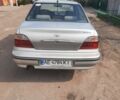 Сірий Деу Нексія, об'ємом двигуна 1.5 л та пробігом 200 тис. км за 1999 $, фото 3 на Automoto.ua