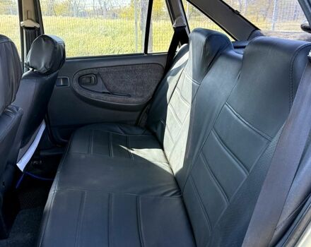 Сірий Деу Нексія, об'ємом двигуна 1.5 л та пробігом 294 тис. км за 1800 $, фото 8 на Automoto.ua