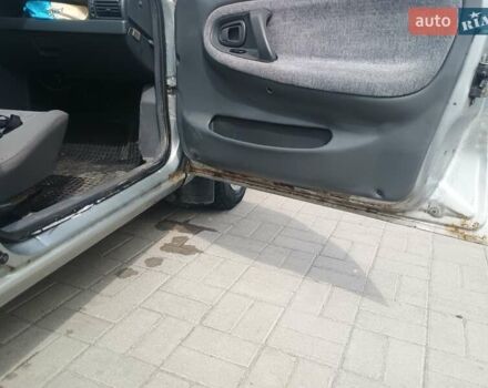 Сірий Деу Нексія, об'ємом двигуна 1.5 л та пробігом 144 тис. км за 1328 $, фото 9 на Automoto.ua