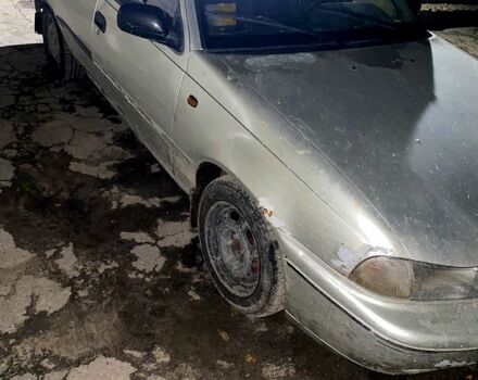 Сірий Деу Нексія, об'ємом двигуна 1.5 л та пробігом 350 тис. км за 1000 $, фото 3 на Automoto.ua