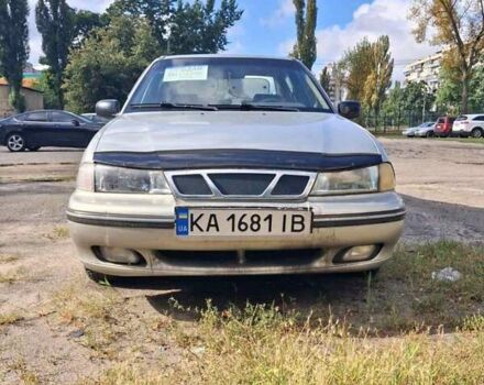 Сірий Деу Нексія, об'ємом двигуна 1.5 л та пробігом 150 тис. км за 1328 $, фото 2 на Automoto.ua