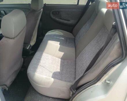 Сірий Деу Нексія, об'ємом двигуна 1.5 л та пробігом 144 тис. км за 1328 $, фото 16 на Automoto.ua