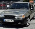 Серый Дэу Нексия, объемом двигателя 1.5 л и пробегом 191 тыс. км за 1899 $, фото 1 на Automoto.ua