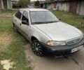 Сірий Деу Нексія, об'ємом двигуна 1.5 л та пробігом 128 тис. км за 1056 $, фото 1 на Automoto.ua