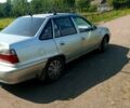 Сірий Деу Нексія, об'ємом двигуна 1.5 л та пробігом 157 тис. км за 2000 $, фото 1 на Automoto.ua