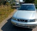 Сірий Деу Нексія, об'ємом двигуна 1.5 л та пробігом 157 тис. км за 2000 $, фото 2 на Automoto.ua