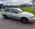 Сірий Деу Нексія, об'ємом двигуна 1.5 л та пробігом 221 тис. км за 1195 $, фото 1 на Automoto.ua