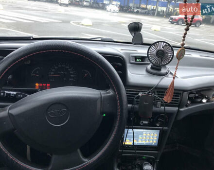 Сірий Деу Нексія, об'ємом двигуна 1.5 л та пробігом 330 тис. км за 1650 $, фото 12 на Automoto.ua