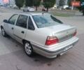 Сірий Деу Нексія, об'ємом двигуна 1.5 л та пробігом 144 тис. км за 1328 $, фото 4 на Automoto.ua