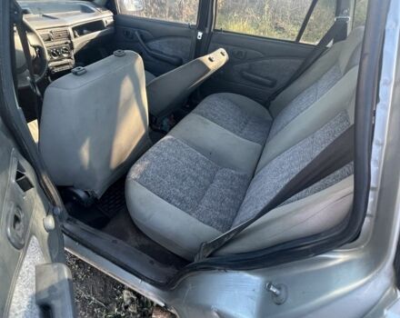 Сірий Деу Нексія, об'ємом двигуна 1.5 л та пробігом 77 тис. км за 566 $, фото 2 на Automoto.ua