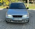 Сірий Деу Нексія, об'ємом двигуна 1.5 л та пробігом 300 тис. км за 1600 $, фото 1 на Automoto.ua