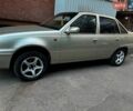 Сірий Деу Нексія, об'ємом двигуна 1.5 л та пробігом 214 тис. км за 2000 $, фото 1 на Automoto.ua