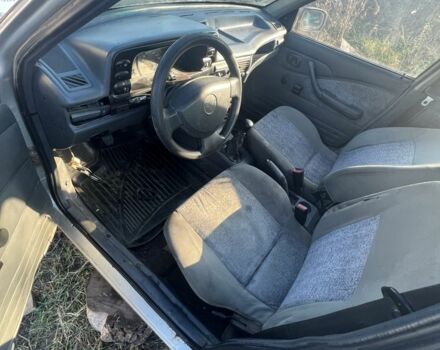 Сірий Деу Нексія, об'ємом двигуна 1.5 л та пробігом 77 тис. км за 566 $, фото 1 на Automoto.ua