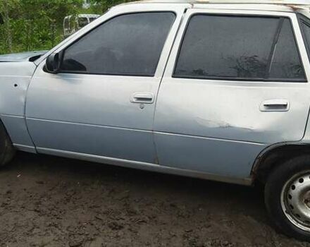 Серый Дэу Нексия, объемом двигателя 1.5 л и пробегом 334 тыс. км за 329 $, фото 1 на Automoto.ua