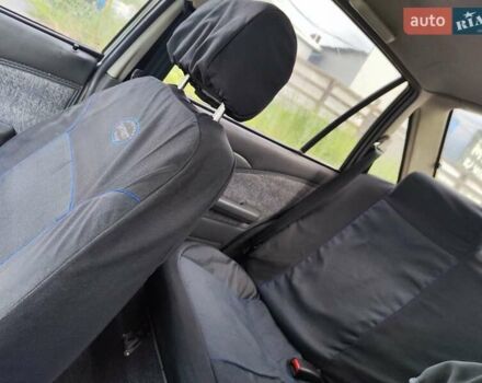 Сірий Деу Нексія, об'ємом двигуна 1.5 л та пробігом 221 тис. км за 1195 $, фото 7 на Automoto.ua
