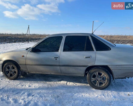 Серый Дэу Нексия, объемом двигателя 1.5 л и пробегом 230 тыс. км за 1800 $, фото 2 на Automoto.ua