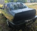 Сірий Деу Нексія, об'ємом двигуна 1.5 л та пробігом 395 тис. км за 1099 $, фото 2 на Automoto.ua