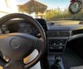 Сірий Деу Нексія, об'ємом двигуна 1.5 л та пробігом 107 тис. км за 1606 $, фото 6 на Automoto.ua